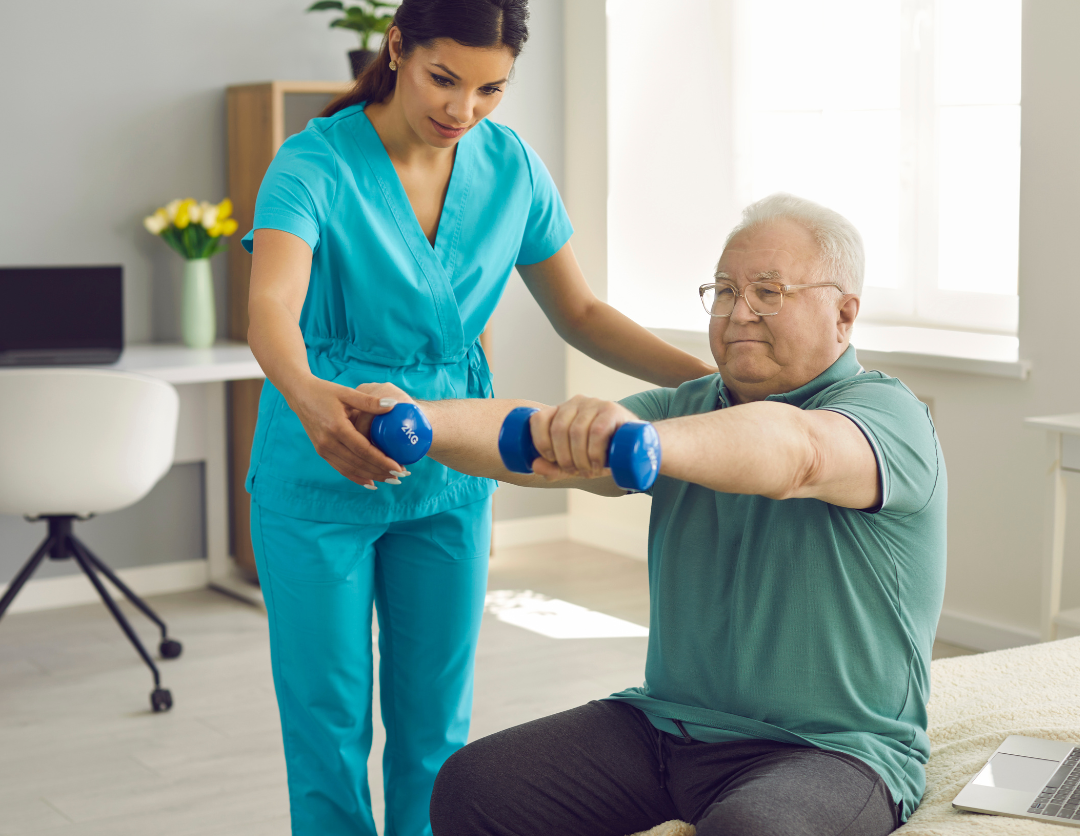 A physiotherapist working with a man holding weights