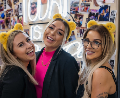 Jenna McFarlane wearing Children in Need ears with colleagues