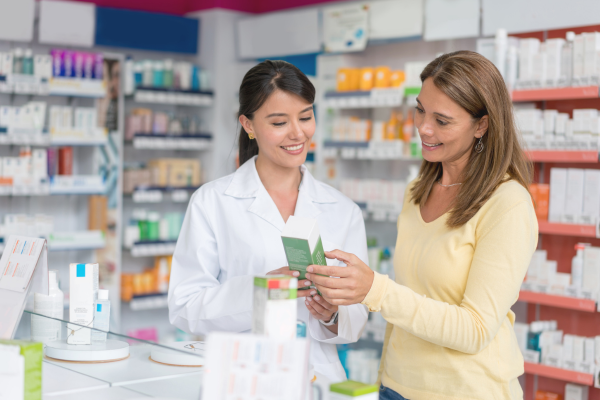 A Pharmacy Assistant helping a customer